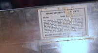 Image # 69189: Planets Manufacturer Certificate 
(The certificate shows serial number 99612. Note that the stamped Model number 'Zodiac' is overscored with the letter 'P' for 'Planets'. Located inside the front cabinet wall at bottom end of playfield.)