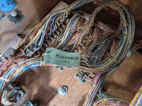 Image # 82014: Planets Inside Cabinet - Cable Tag 
(The cabinet is stamped with serial number 95592.)