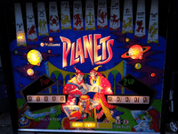 Image # 82016: Planets Illuminated Backglass 
(Serial number 99545.)