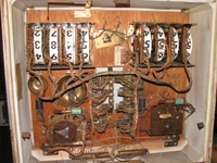 Image # 45760: Pleasure Isle Inside Backbox 
(On the game pictured here, the bell assembly to the right of center is missing its bell. Serial number 08195.)