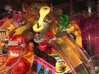 Image # 31928: Radical! Prototype Playfield - Detail 
(The skateboard-shaped diverter does not have the stripes present in production games.)