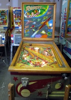 Image # 52405: Rocket Cabinet - Front View 
(The triangular post between the flippers is not original, and would be round. The red flipper above this post is not original and we do not know if it operates. The posts in the lower left and right corners of the playfield have been moved from their original positions.)