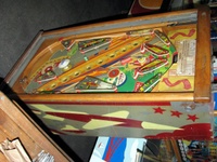 Image # 52400: Rocket Playfield 
(The triangular post between the flippers is not original, and would be round. The red flipper above this post is not original and we do not know if it operates. The posts in the lower left and right corners of the playfield have been moved from their original positions.)