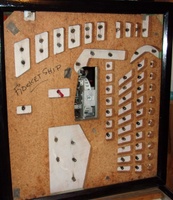 Image # 70399: Rocket Ship Backbox Insert - Unused Game Over Feature 
(In this picture, a red straw has been inserted into the hole where neither a lamp socket or wiring was installed by the factory.)