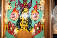 Image # 39375: Abra Ca Dabra Sample Game - Lower Middle Playfield - Light Shields Removed 
(The small white lights shields nearest the flippers may not be original to sample games. They do not appear on the flyer. Serial number 01015 S.)
