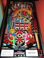 Image # 38887: Rollergames Playfield 
(The rose-colored plastic above the green drop targets is not original to this game.)