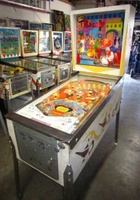 Image # 58012: Bazaar Cabinet - Full View 
(Bally manufactured this game using white flippers with white rubbers on them.)