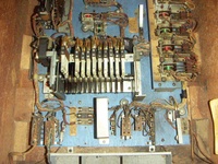 Image # 69134: Safari Inside Cabinet - Front 
(The 'Total Play' meter has been removed from the front left corner of the motor board. One of its two mounting holes is partially obscured by the wiring going to the three fuses. What was mounted in the two screw holes visible here forward of the fuses is unknown. Serial number 1354.)