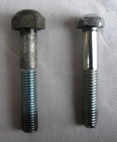 Image # 48756: Sapporo Bolt Comparison 
(The left bolt is from the Sapporo game and is threaded Metric,10 millimeter. For comparison, the bolt on the right is threaded US Standard 3/8 UNC.)