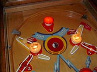 Image # 32743: Saratoga Illuminated Upper Playfield 
(The upper playfield has stationary bumpers that look like flippers.)