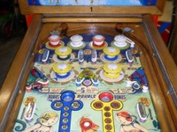 Image # 13624: Sea Belles Upper Playfield 
(Note that this playfield has had artwork added to it.  The gobble holes, lower side targets, pop bumpers rings, and upper ball arch have been modified.)