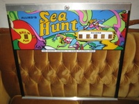 Image # 42676: Sea Hunt Backglass 
(This game was obtained New In Box in 2004, five years before this photograph was made. Serial number 8943.)