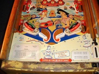 Image # 66234: Serenade Lower Playfield 
(The owner states the pop bumpers caps, standup targets, and flippers are replacement parts.)