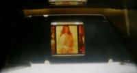 Image # 56119: Sexy Girl Film Strip - Detail 
(The film image is seen reflected in a mirror.)