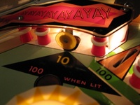 Image # 41236: Beat Time Illuminated Playfield - Detail - Blue Version #90909 
(Serial number 90909.)