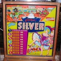 Image # 30117: Silver Backglass 
(The blue area around the game name appears to have been repainted, removing the 's' after the apostrophe as well as the 'periods' between V-E-R. This image is included here to show its other detail.)