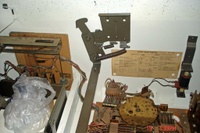 Image # 39891: Sing Along Inside Cabinet 
(This view shows the cashbox, both tilt mechanisms, playfield clamp, score motor, and knocker.)