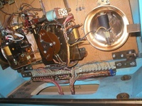 Image # 41810: Sing Along Inside Lower Backbox 
(Replay unit on left. Ball count unit in center. 100-point bell on right.)