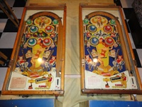 Image # 58257: Sittin' Pretty Sample Game - Playfield Comparison 
(The production playfield is on the left and should have white flipper rubbers. A Sample playfield is on the right and is missing its large center plastic. Serial number 22006 S.)