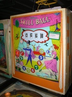 Image # 23123: Skill-Ball Backglass 
(This is not the correct cabinet for this game. The cabinet belonged to Williams 1962 'King Pin'.)