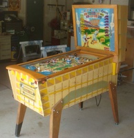 Image # 48764: Sluggin' Champ 'Deluxe' Cabinet - Right 
(All plastic parts on this playfield are reproduction, as is the blue tray liner, but we show this image to present the cabinet design.)
