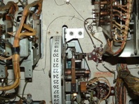 Image # 41063: Smart Set Engineering Sample - Inside Backbox  - Detail 
(Two screw holes in the insert directly above the replay wheel suggest experimentation.)