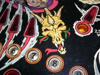 Image # 53365: Sorcerer Lower Skull - Red and Green Feathers 
(Robe is royal purple with pink trim.)