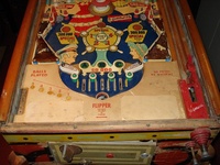 Image # 40595: Southern Belle Sample Game - Lower Playfield 
(The flat light shield plastics on this game are extremely heat-damaged. Serial number 7716.)
