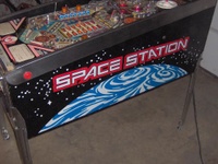 Image # 37261: Space Station Cabinet - Right 
(The bottom pop bumper cap is missing the round decorative attachment that is seen on the other two caps.)
