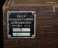 Image # 54715: Space Time Laminated Cabinet - Serial Number Plate 
(This game has a laminated cabinet. Serial number 5438.)