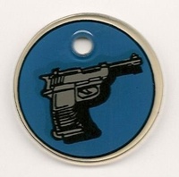 Image # 46254: Spy Hunter Promo Key Fob 
(A key fob was included with each sheet of original playfield plastics. It measures 3.5 cm in diameter by 2 mm in thickness. The hole measures 5 mm in diameter.)