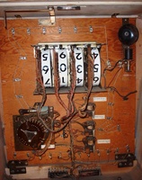 Image # 58608: Square Head Inside Backbox 
(Unterminated wires on the right side of the insert show where a bell and coil assembly had been removed from this game.)