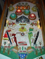 Image # 15609: Straight Flush Playfield 
(The blue cover is missing from the roto-target assembly, revealing two light bulb sockets.)