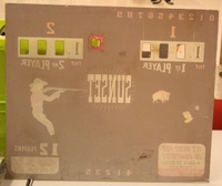 Image # 38317: Sunset Plexiglas Backglass - Reverse 
(A hole was drilled in the replay window of this plastic backglass.)