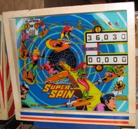 Image # 38960: Super Spin Sample Game - Backglass 
(Serial number 01124 S.)