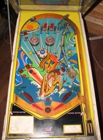 Image # 59760: Surfing Playfield 
(One of the pop bumper caps is not original to this game. Serial number 0383.)