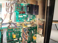 Image # 39443: Big Guns Inside Backbox - Right 
(The thick white wire on the left side in this image leads to a stand-alone battery holder in the upper right area of the backbox and is an after-factory modification. Serial number 557 118502. System 11A CPU.)