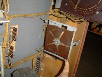Image # 68126: Thing 10,000 Point Stepper - Back Side 
(Located inside the backbox, this unit swings out on a hinge. Serial number 21550.)
