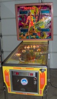 Image # 53435: Totem Sample Game Illuminated Front View 
(The backglass was identified to us as New Old Stock. Serial number 01415 S.)