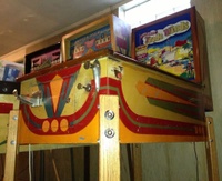 Image # 55318: Trade Winds Cabinet - Front View 
(The serial number located on the lower right corner of the cabinet front has been obliterated. The owner's grandfather found it this way when he obtained this game in the early 1950's.)