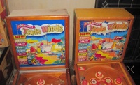 Image # 62879: Trade Winds Backbox Comparison 
(The silver trim around the left playfield is spray paint added by a previous owner.)