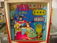 Image # 16777: Trio Illuminated Backglass 
(This game has serial number TR 2106.)