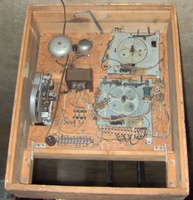 Image # 51416: Tumbleweed Inside Backbox 
(The unit in the upper right corner has had some parts removed. Nearby, one of the bell units has been taken apart.)