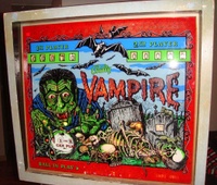 Image # 55796: Vampire Alternate Backglass - No Shadowing 
(The score reel windows do not have the dark green 'shadowing' along each window's bottom and right edges that is found on most other glasses. Serial number 2222.)