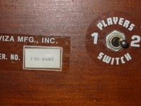 Image # 43220: War Serial Number and Player Switch 
(Serial number 130-2482.)
