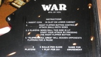 Image # 54371: War Instruction Card 
(The operator removed references to one-player operation.)