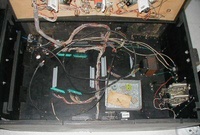 Image # 18252: War Inside Cabinet 
(The power supply board and the control board have both been removed from this game, leaving the connectors laying in the cabinet.)