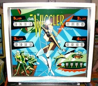 Image # 18398: The Wiggler Early Production Backglass 
(This game is serial number 1077, the 77th game produced.)