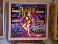 Image # 50085: The Wiggler Illuminated German Backglass 
(Serial number 2988.)