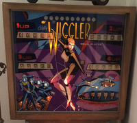 Image # 74330: The Wiggler Backglass - Modified For 5-Digit Scoring 
(The ten match numbers were modified to appear in white circles.)